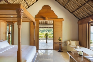 Amankila - Bedroom with view out to terrace