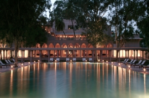 Amanbagh - Pool and main building at night